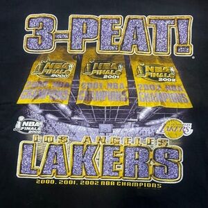 Vintage Lakers Tshirt 
3-peat 2000,2001, and 2002 

Size Medium color black